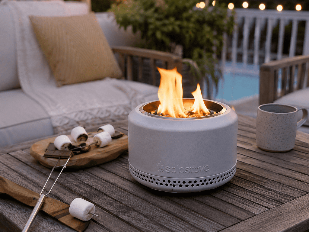 Solo Stove Mesa tabletop fire pit on backyard patio